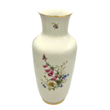 Porcelain flower vase with Digitalis purpurea L.