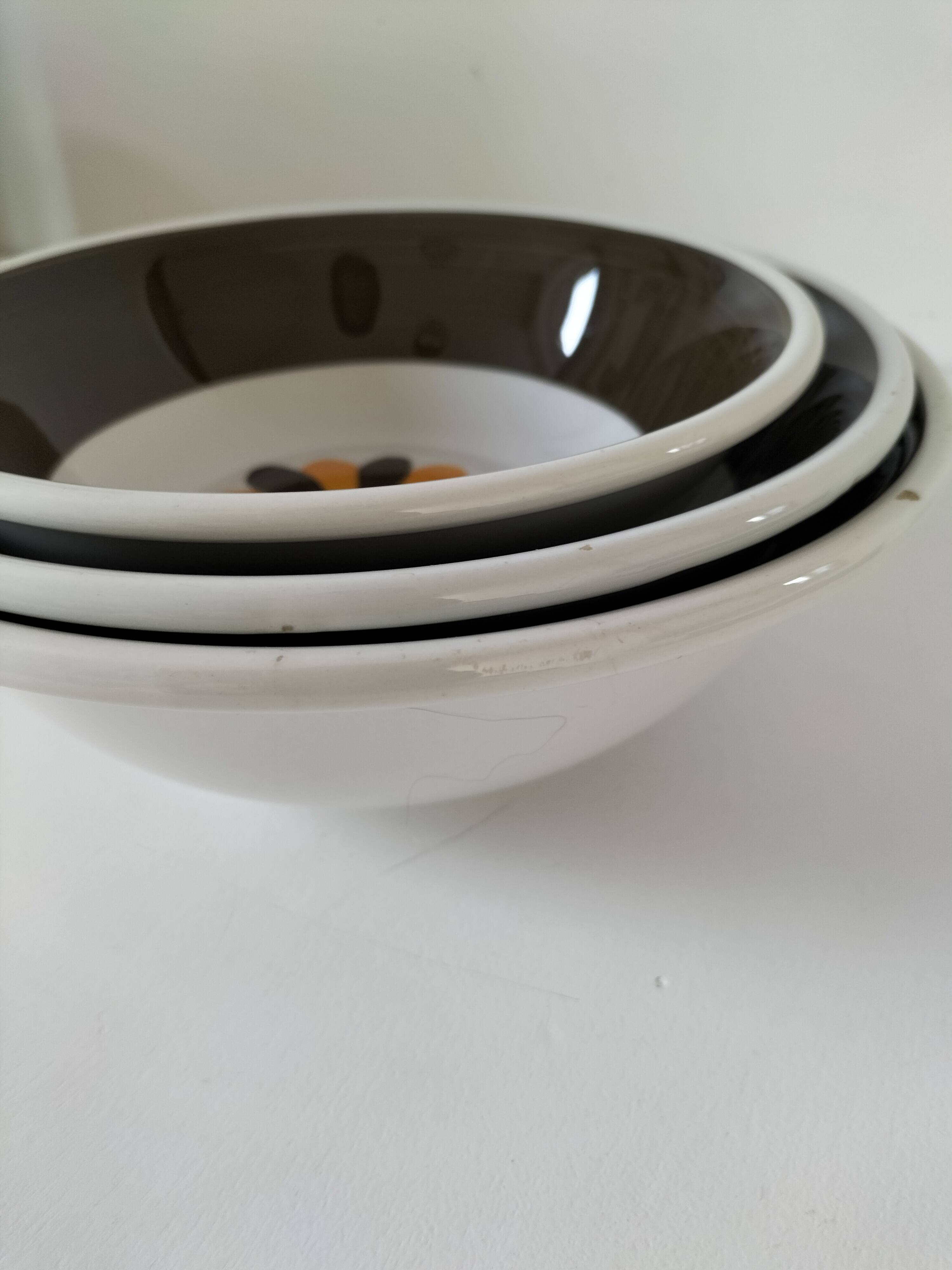 Trio of Italian 1970s deep plates, ochre brown floral decoration