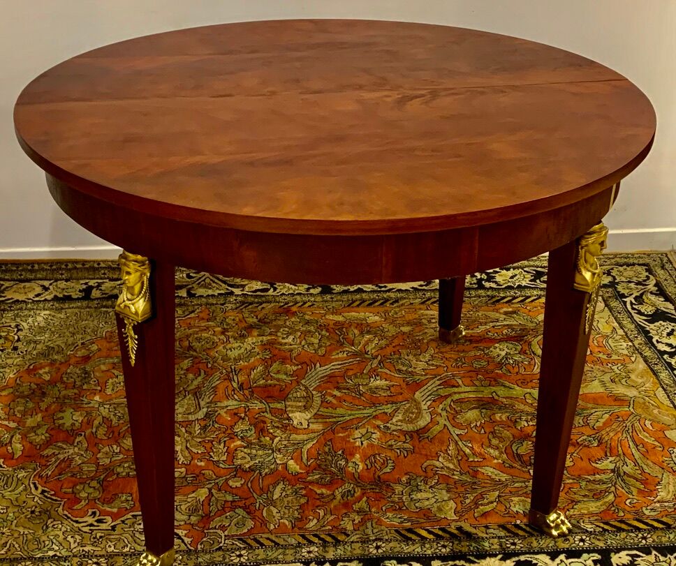 Empire style round table in mahogany