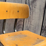 Old metal and wood school chair