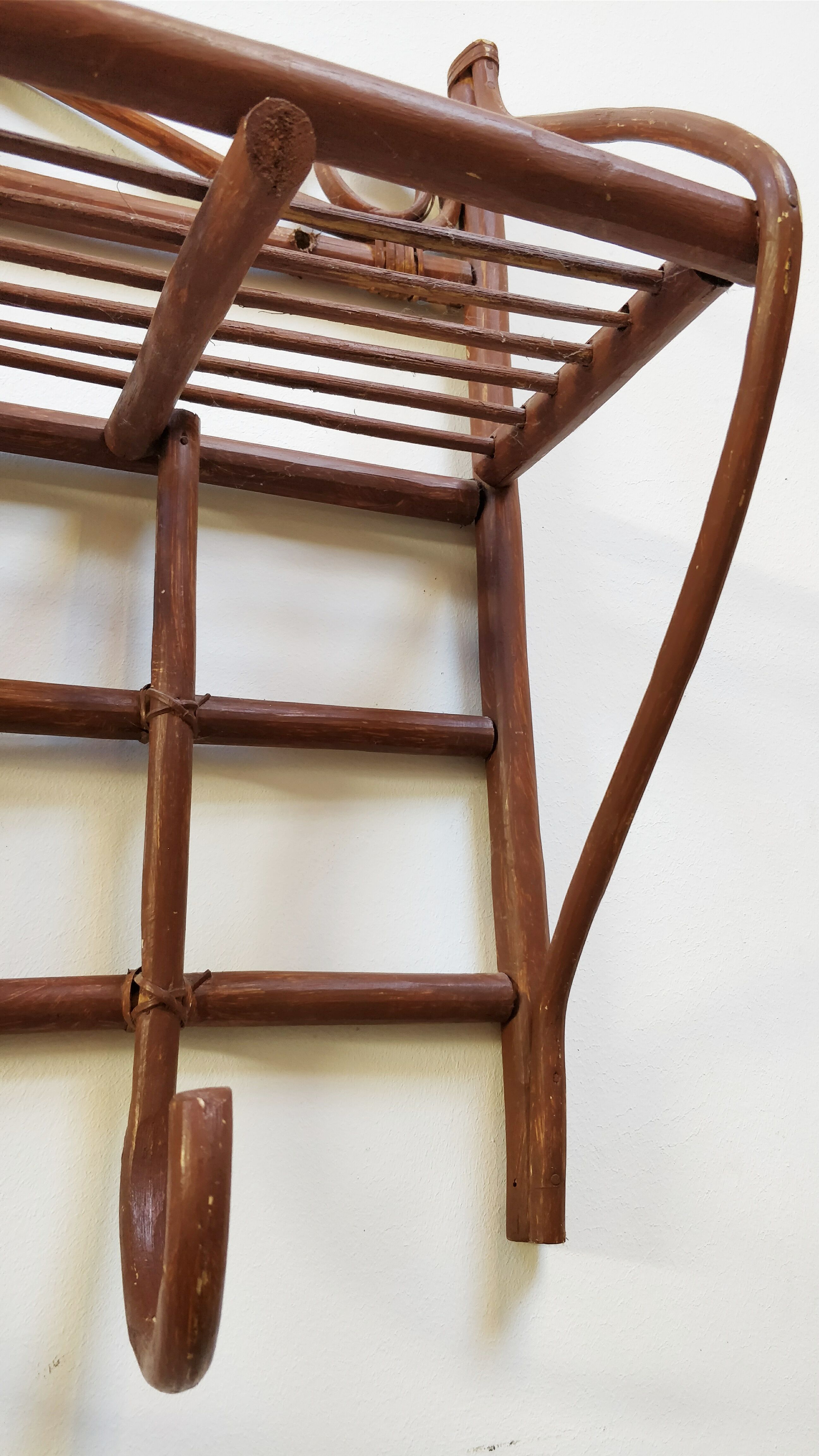 Rattan wall coat rack