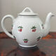 Magnificent teapot and fine porcelain cup set by Pillivuyt with cherries.