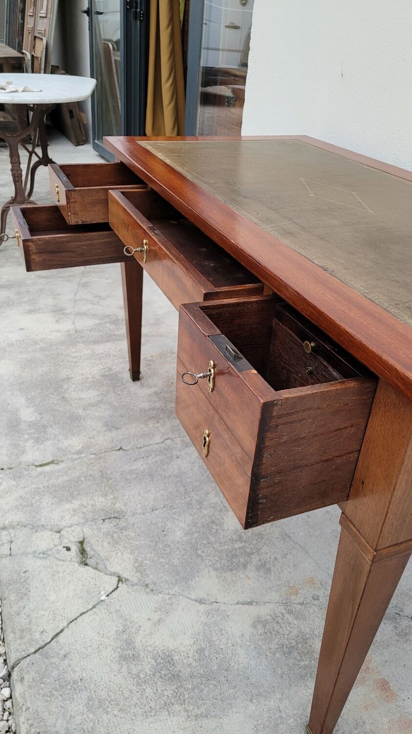 Louis XVI style flat desk in 19th century mahogany