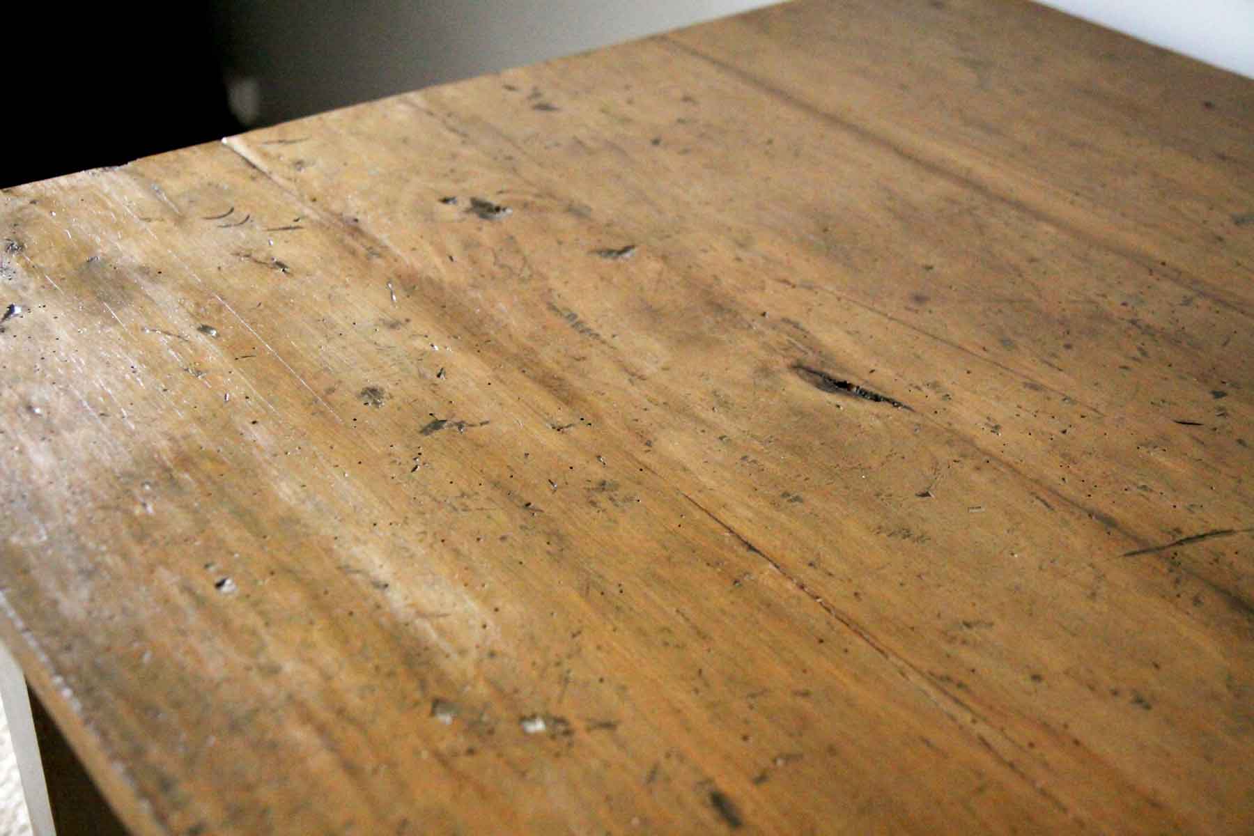 Patinated wooden dining table