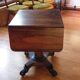 Drop-leaf table in rosewood