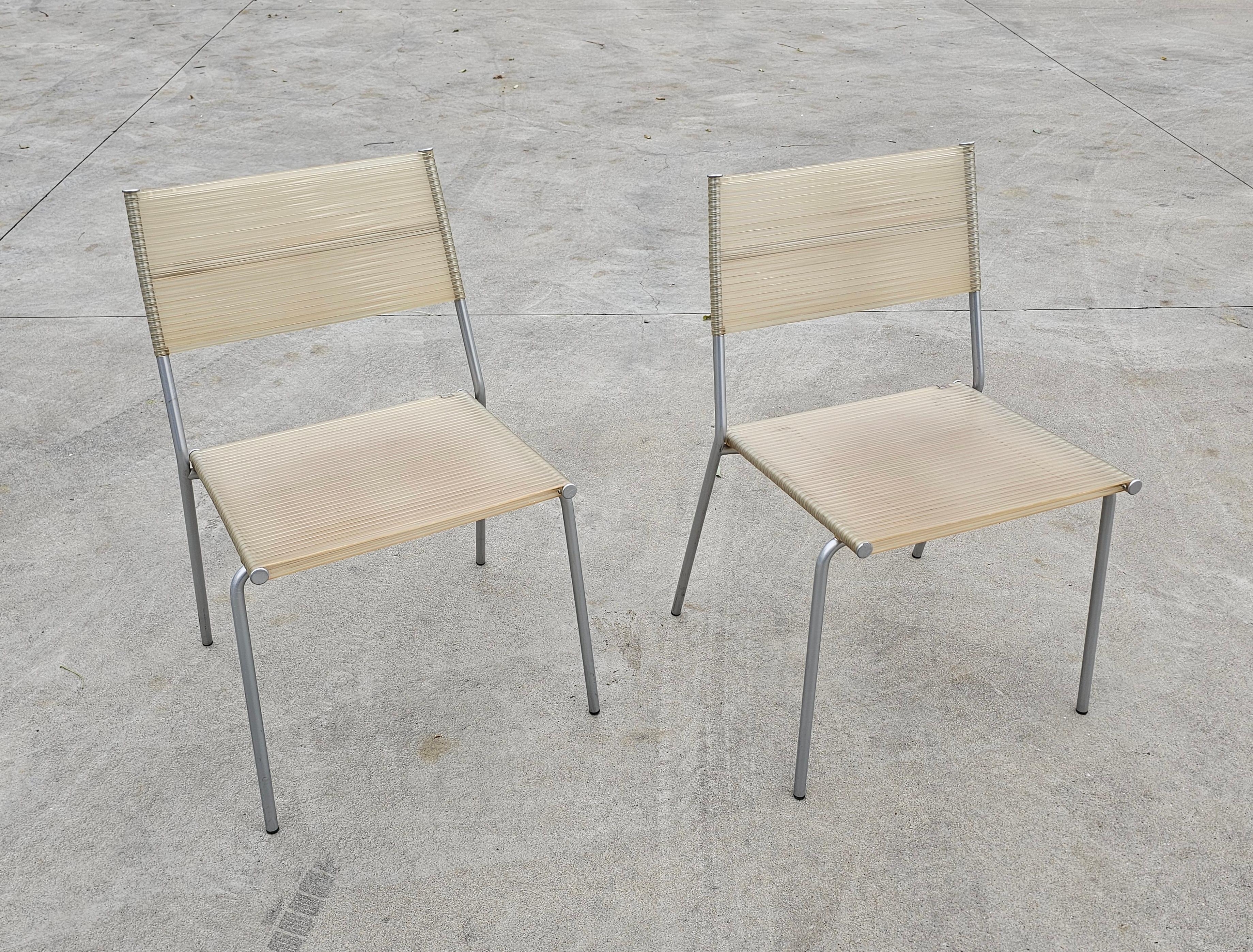 Set of 4 Miss B dining chairs by Tito Agnoli for Bonacina, 1990s.
