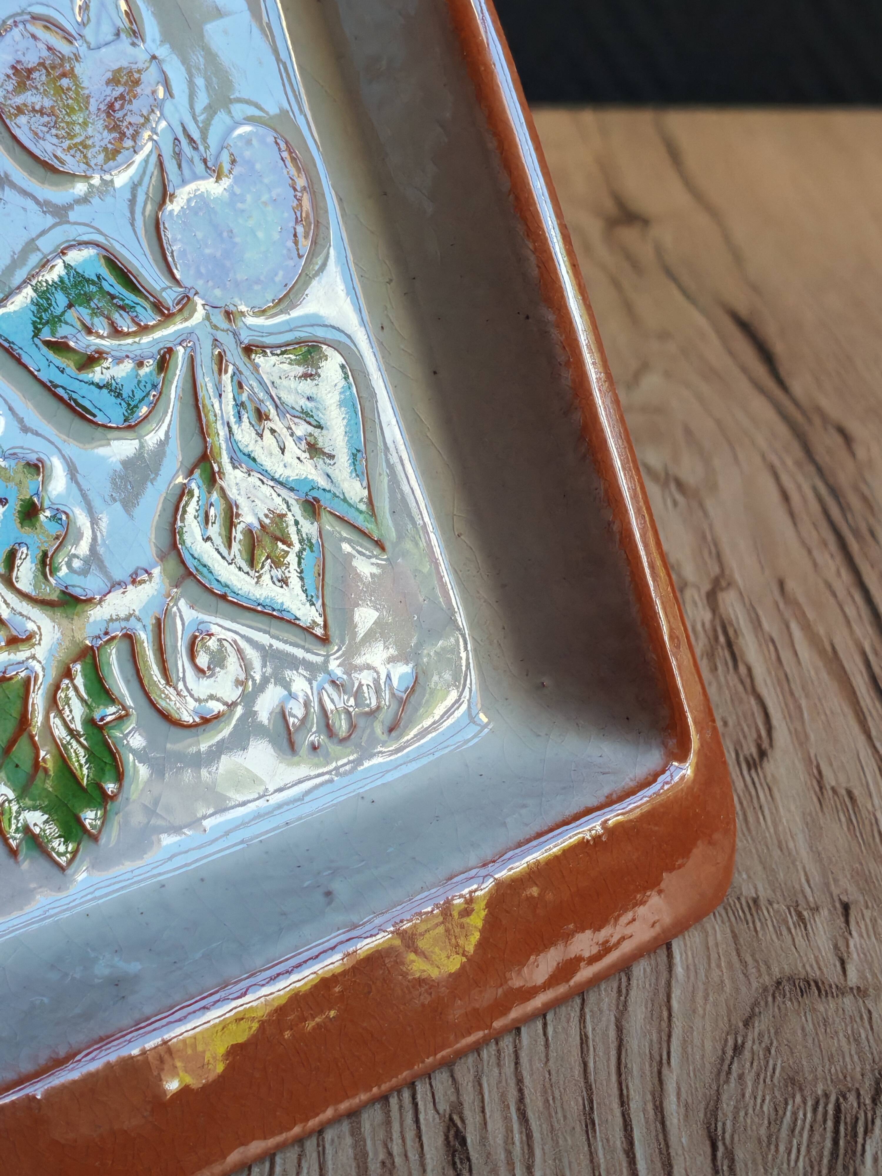 Terracotta plate signed P.Boy, glazed artisanal ceramics.