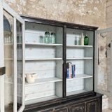 Display cabinet in patinated wood