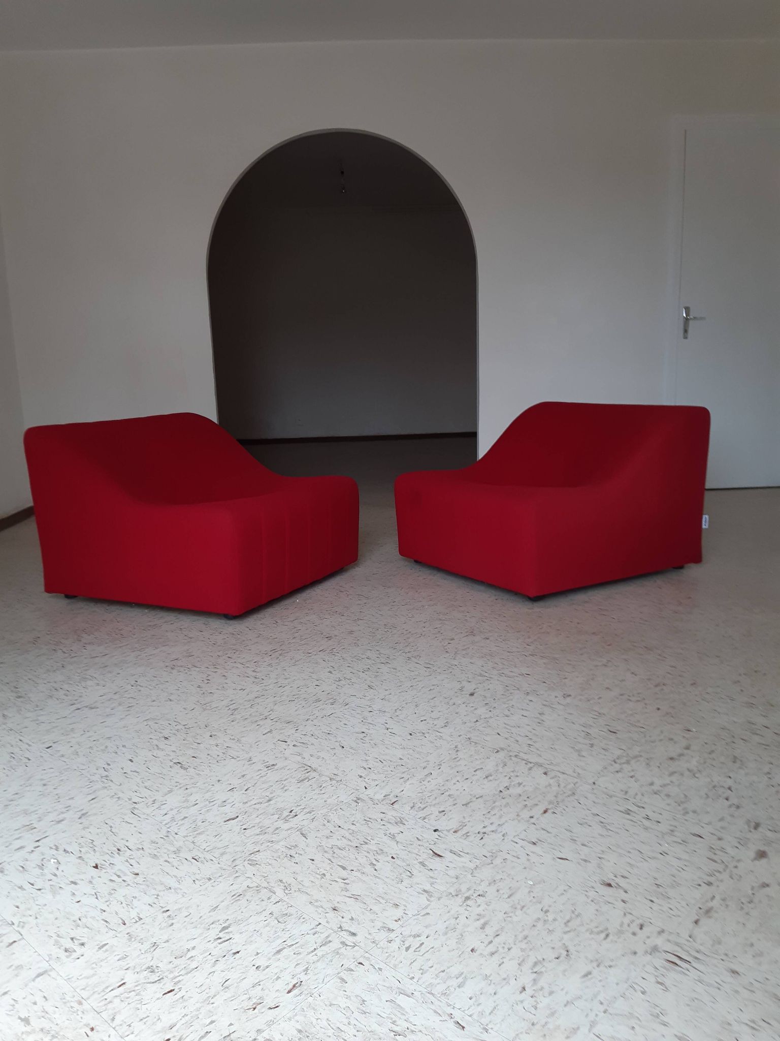 Pair of chromatic swivel armchairs by Kwok Hoi Chan, Steiner