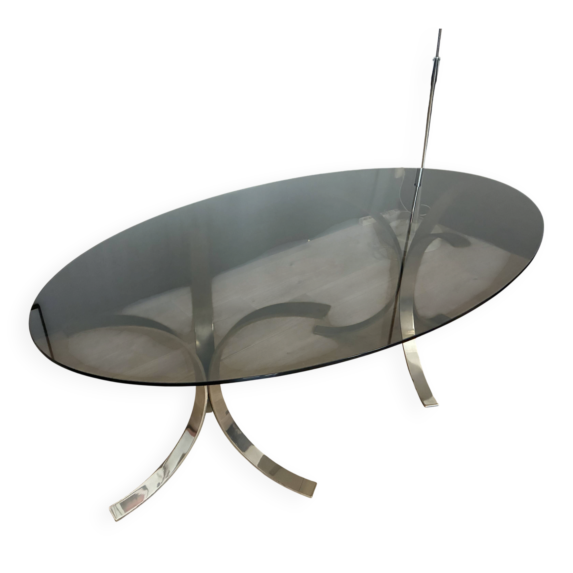 Smoked glass table with a metal base.