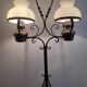 Antique double globe opaline floor lamp, wrought iron, rustic vintage style.
