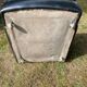 Pair of black imitation leather armchairs