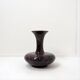 Polished granite vase