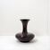 Polished granite vase