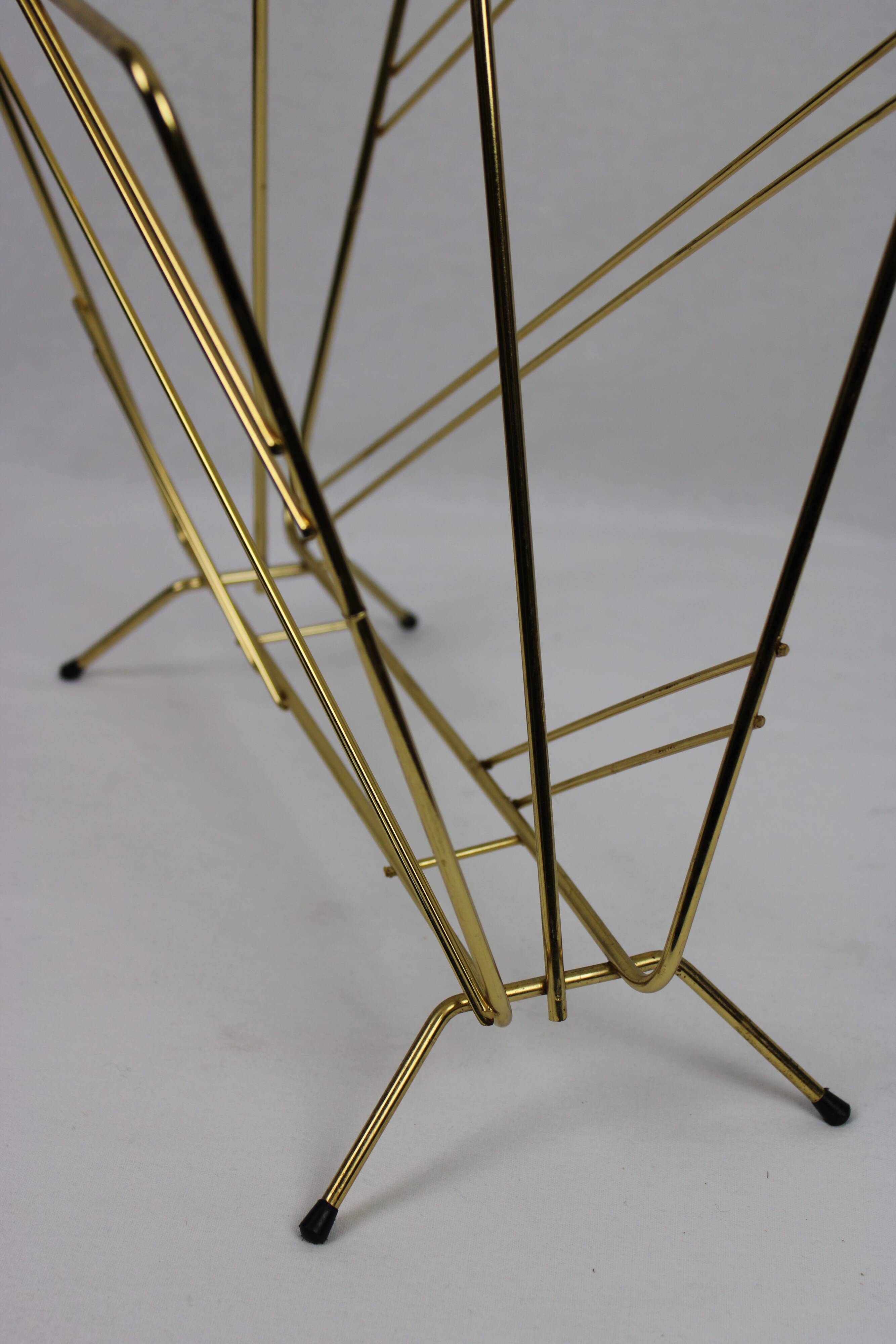 Gold metal magazine holder