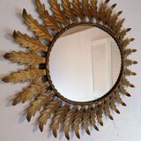 Oval sunburst mirror with leaves of acanthus 1960s