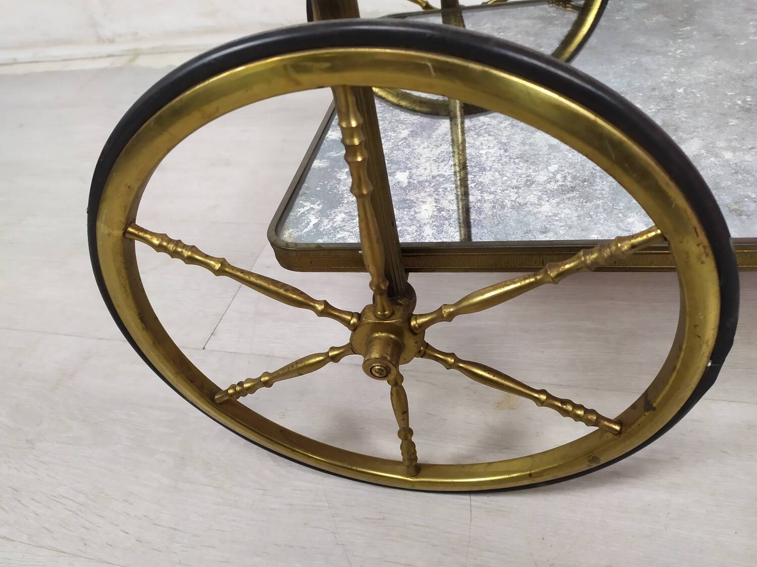 Brass and glass rolling trolley