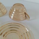 Iridescent cups and saucers