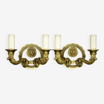 Pair of sconces with Restoration style lion heads