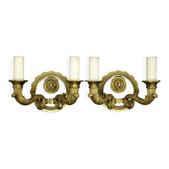 Pair of sconces with Restoration style lion heads