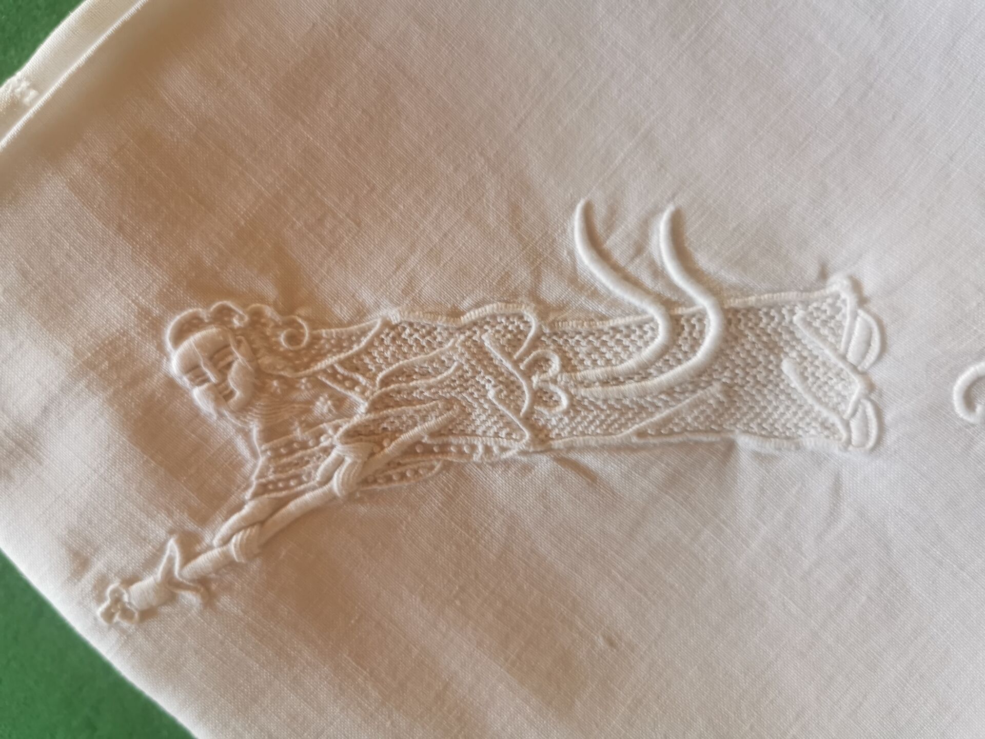 12 old damask linen napkins with a monogram
