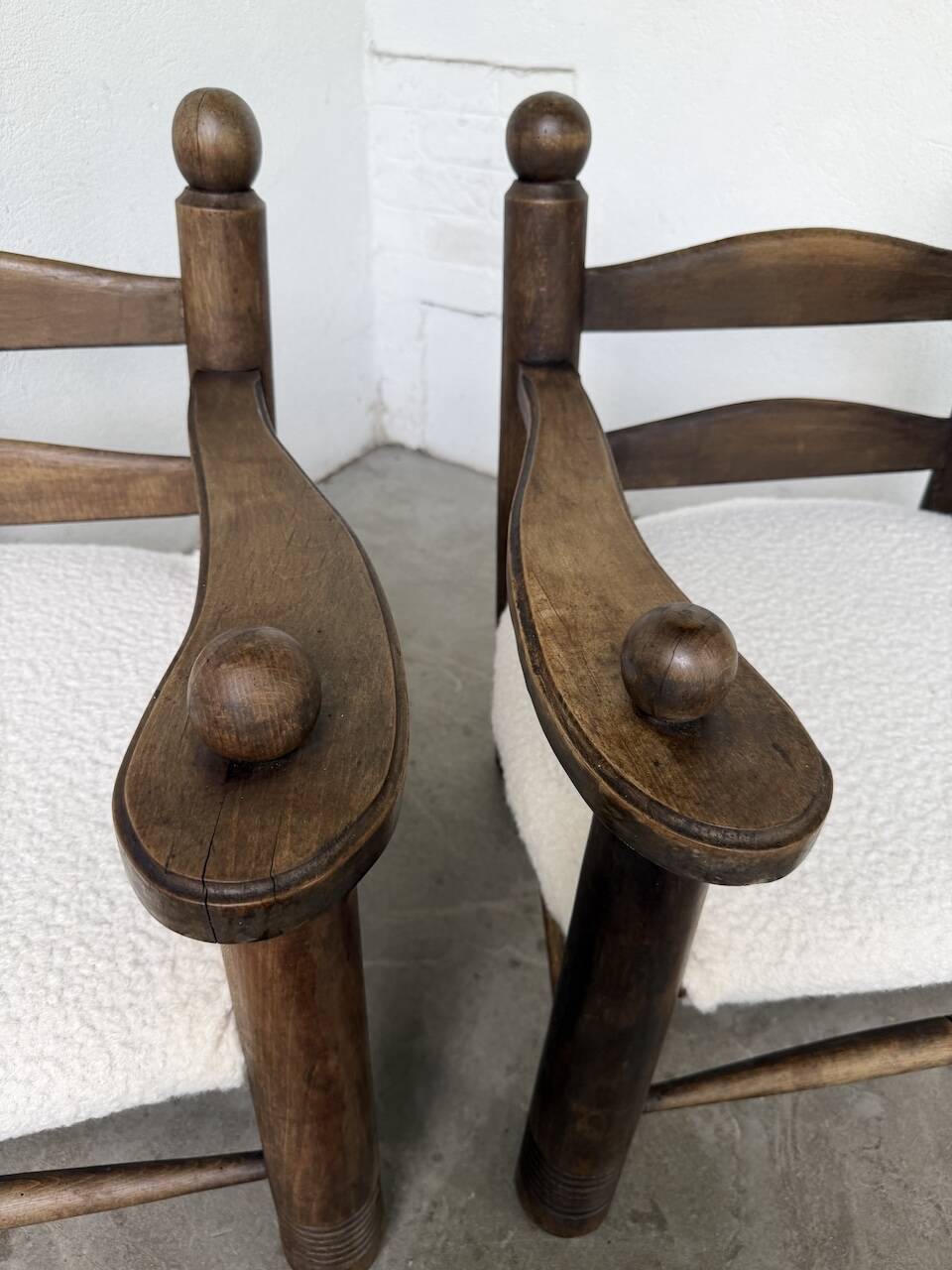 Pair of Dudouyt armchairs from the 1950s, oak.