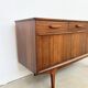 Teak Jentique sideboard — 1 door, 2 drawers & drop-down bar, England 1950s-60s