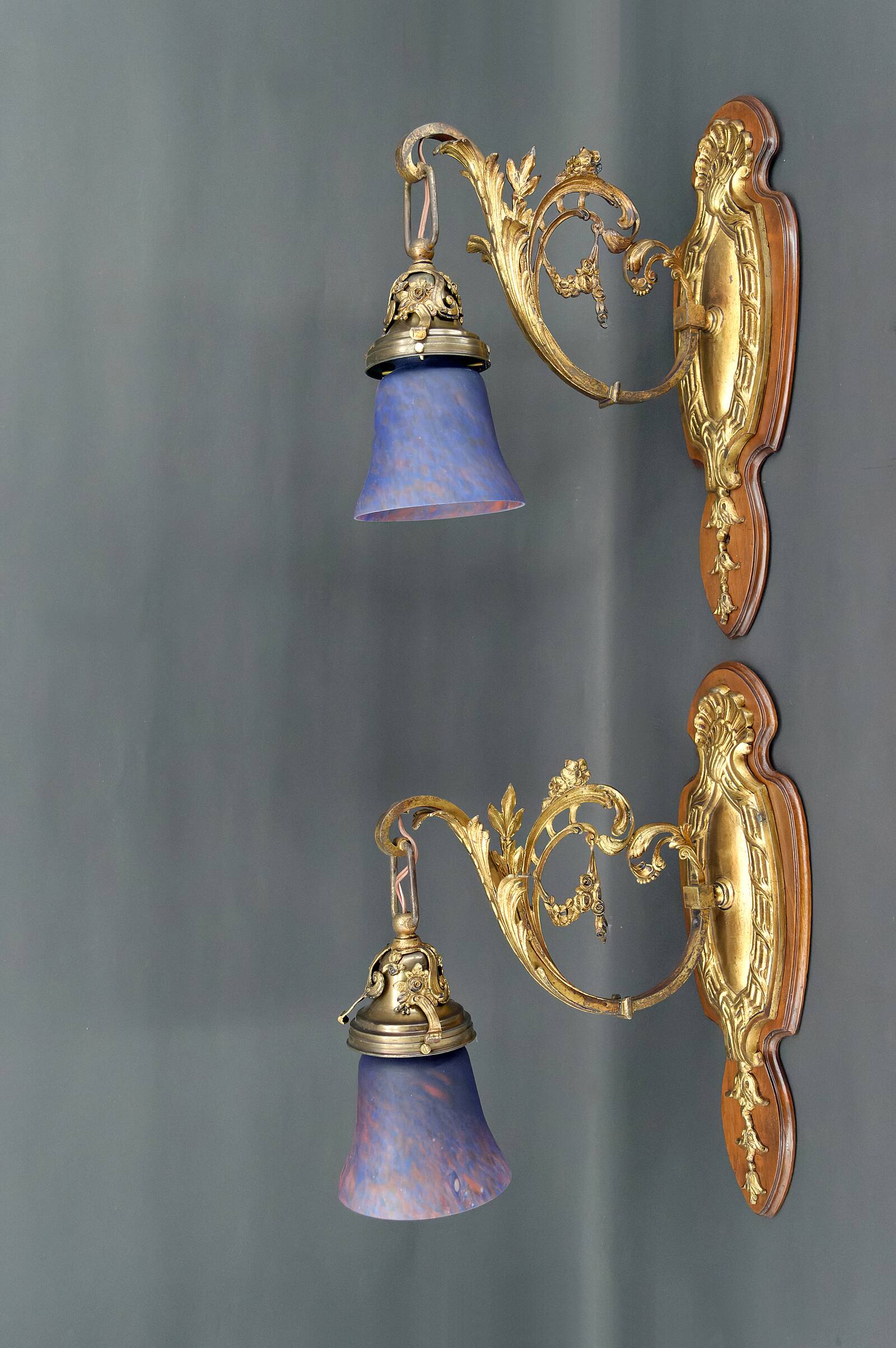 Pair of Rococo / Louis XV wall lights in gilded bronze, walnut bases and glass tulips, France, Circ
