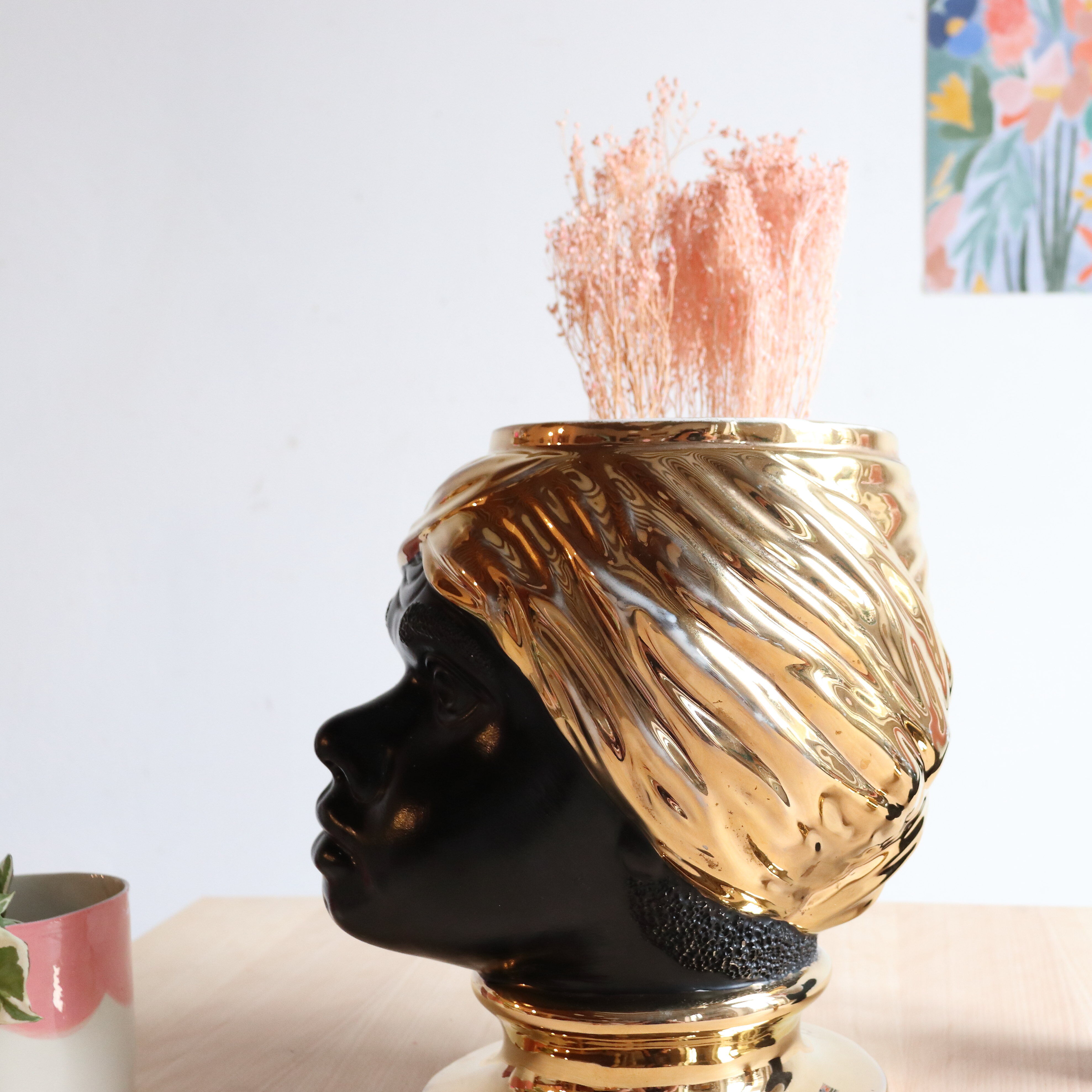 Black and gold Italian ceramic head vase signed Behreno