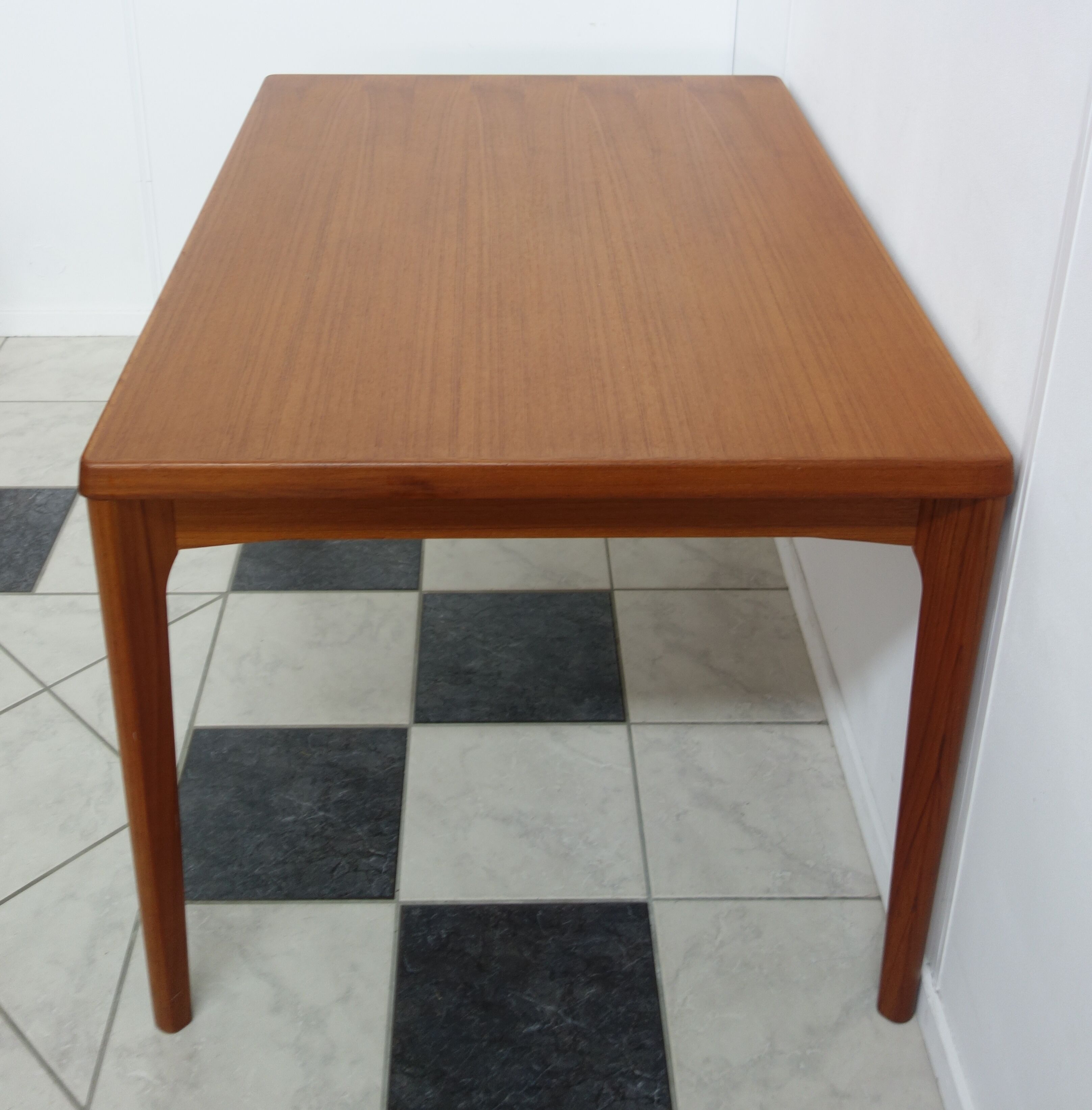 Danish teak dining table by Henning Kjaernulf 1960s