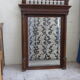 Large mirror beveled Henri II style varnished and carved wooden 128 x 92 cm