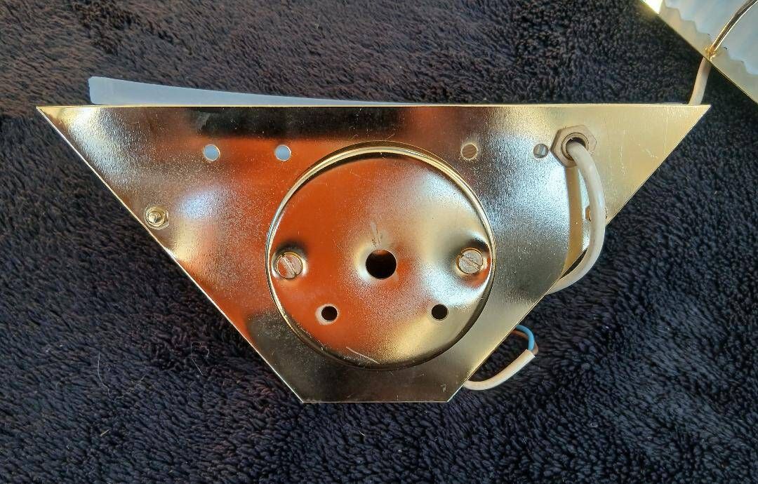 Art Deco wall lights in glass and gilded metal.