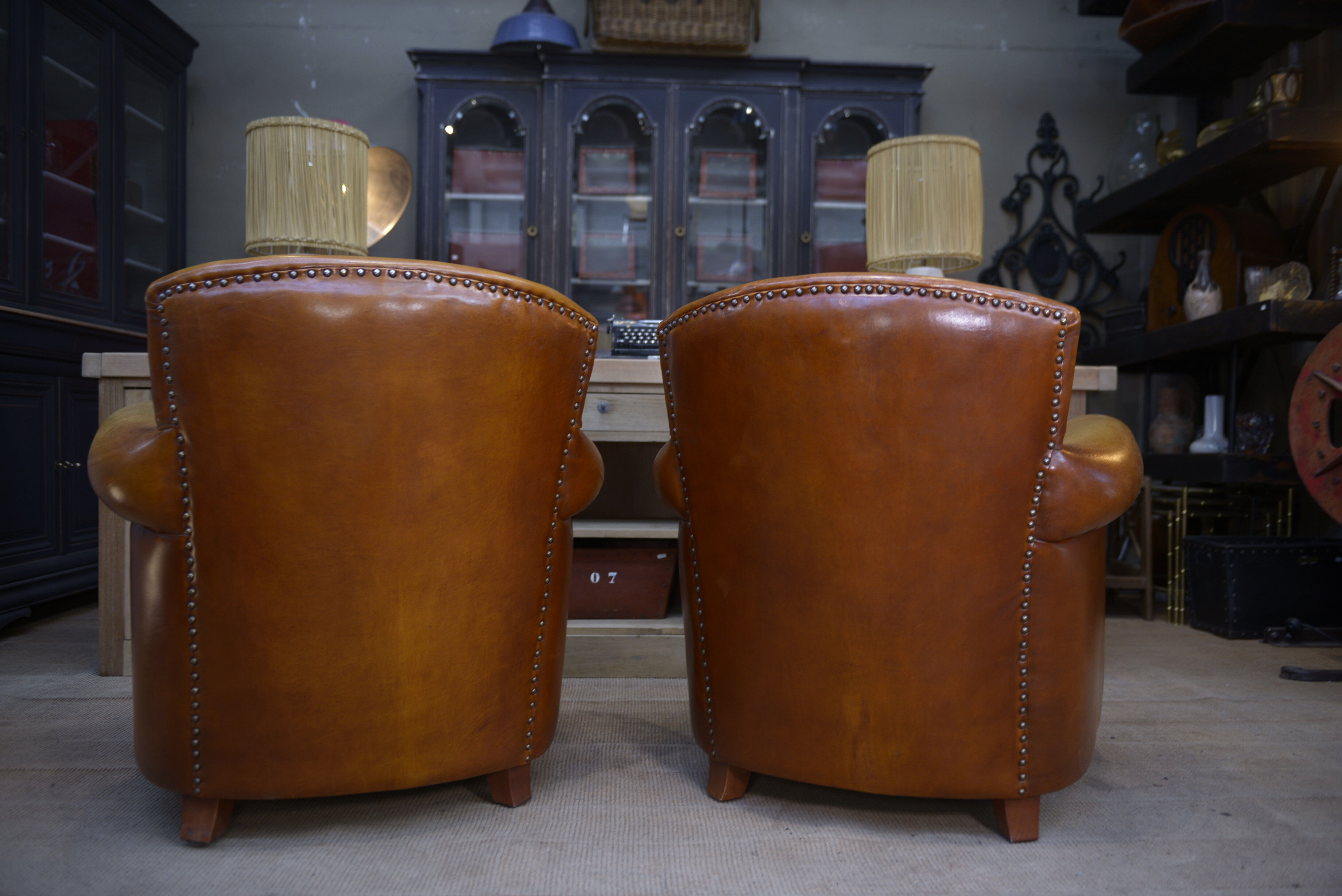 Paire de fauteuils club vintage en cuir
