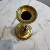 Bougeoir ancien en cuivre à bouton pressoir