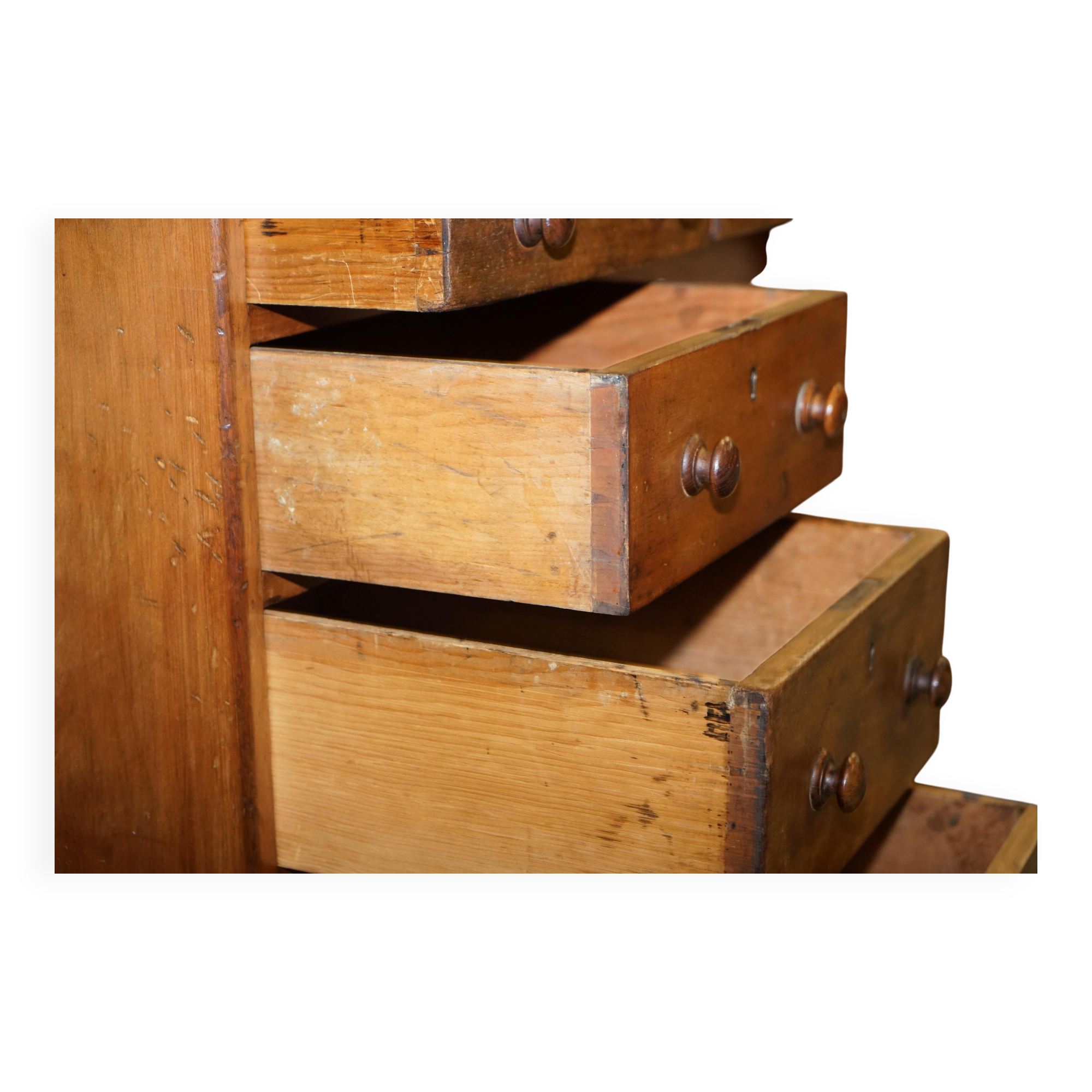 Antique Victorian oak kneehole desk with 18 double-sided drawers.