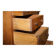 Antique Victorian oak kneehole desk with 18 double-sided drawers.