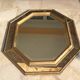 Antique mirror in gilded wood with beveled octagonal shape 72 x 63 cm