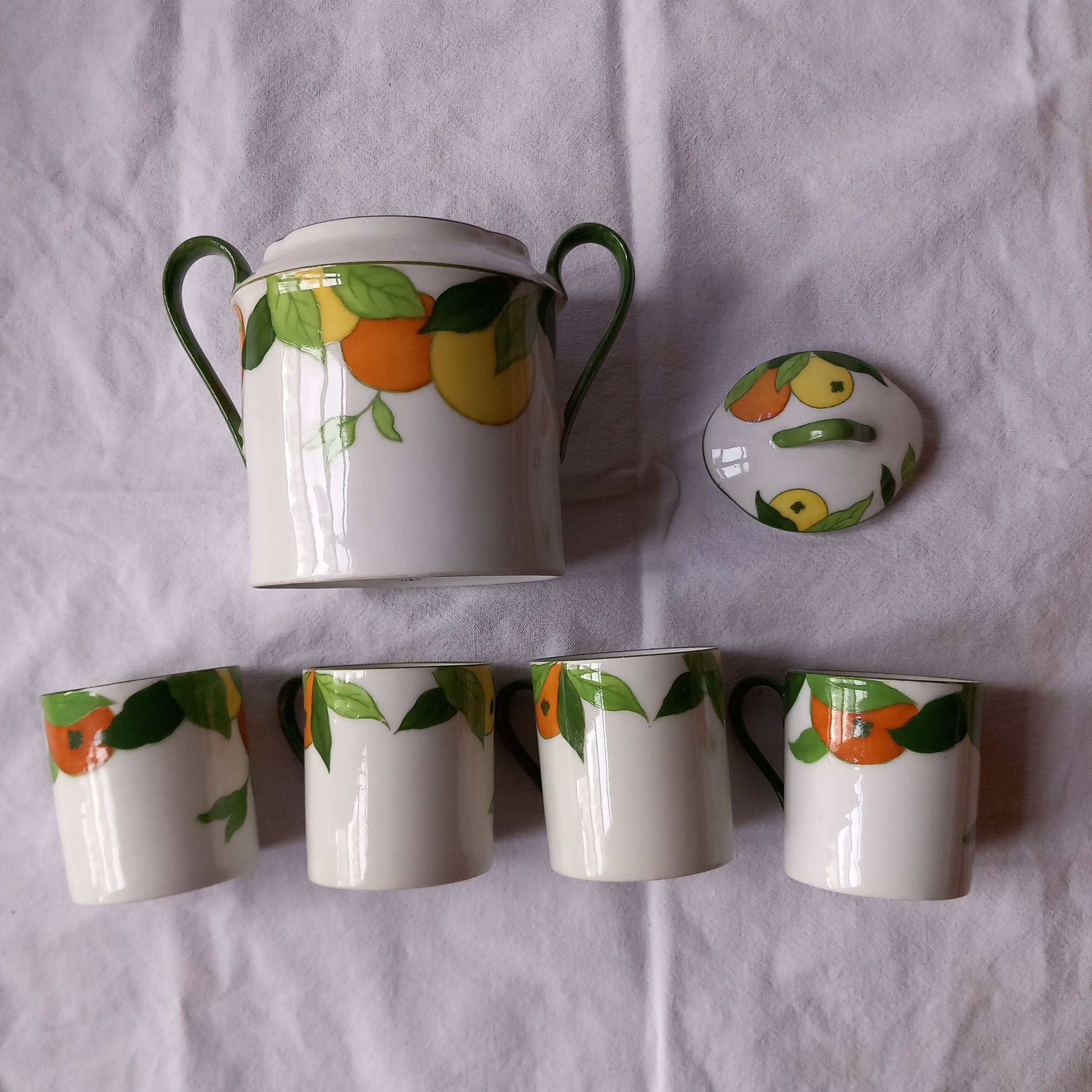 5 cups and a citrus sugar bowl, Lanternier Limoges porcelain