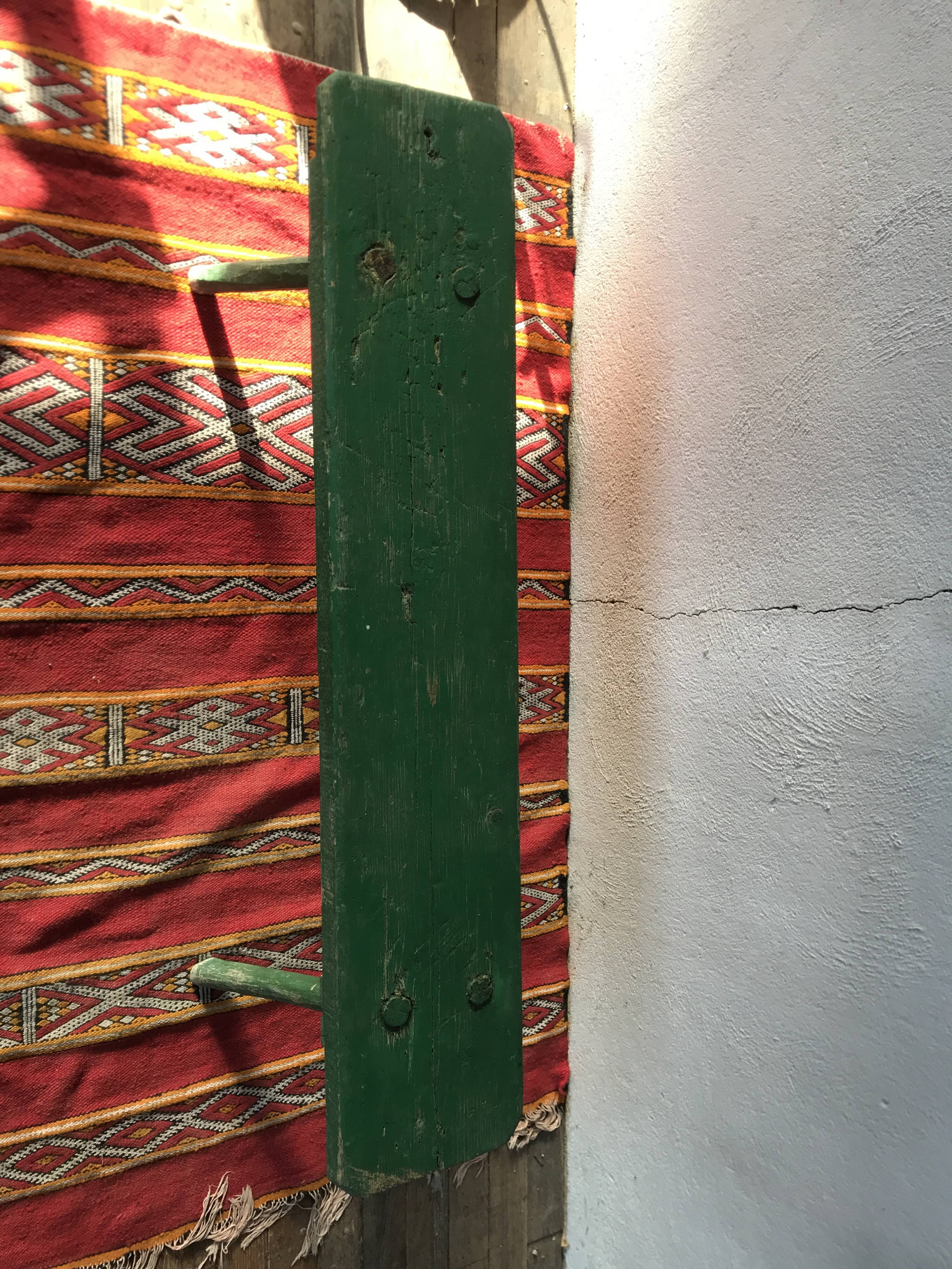 Old vintage bench in green patina fir