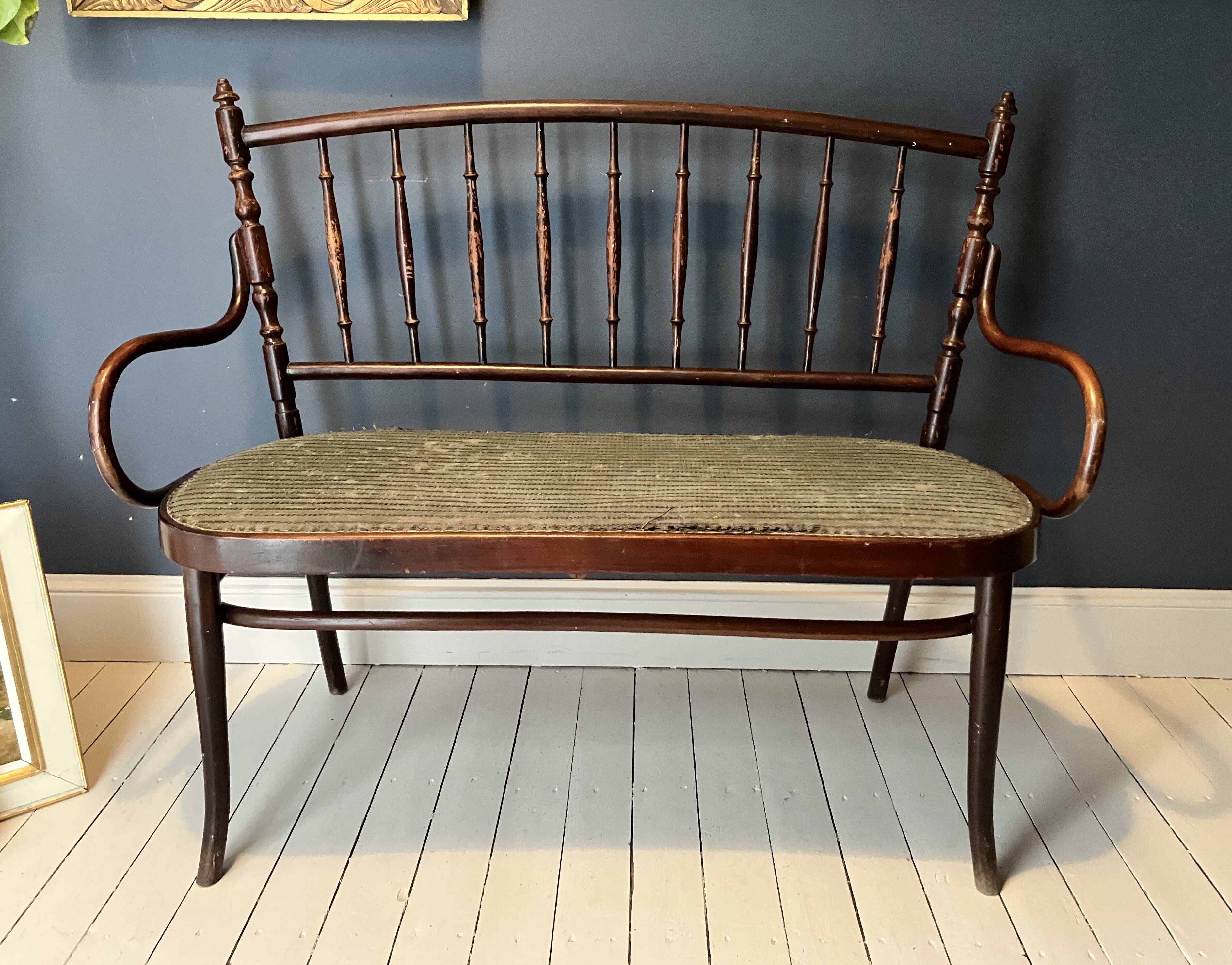 Thonet-branded bistro-style bench in turned wood, velvet and caning
