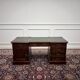 Classic English desk with green leather inlay.