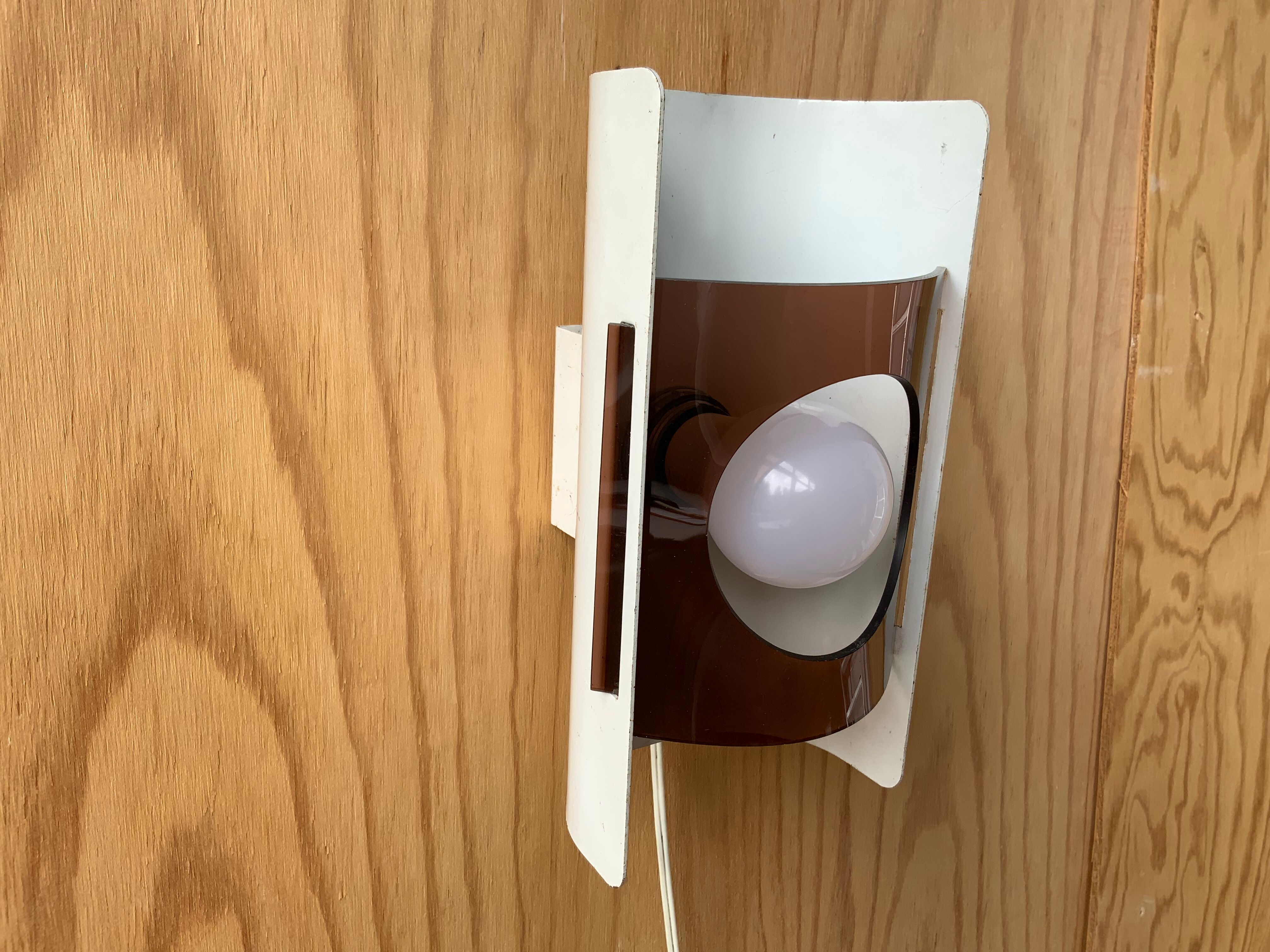 Plexiglas and metal wall lamp