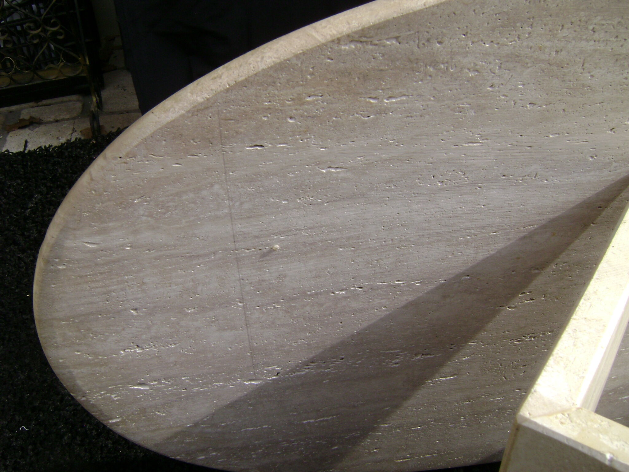 Oval coffee table in travertine italy from the 1970s