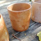 Set of 5 stoneware mugs.