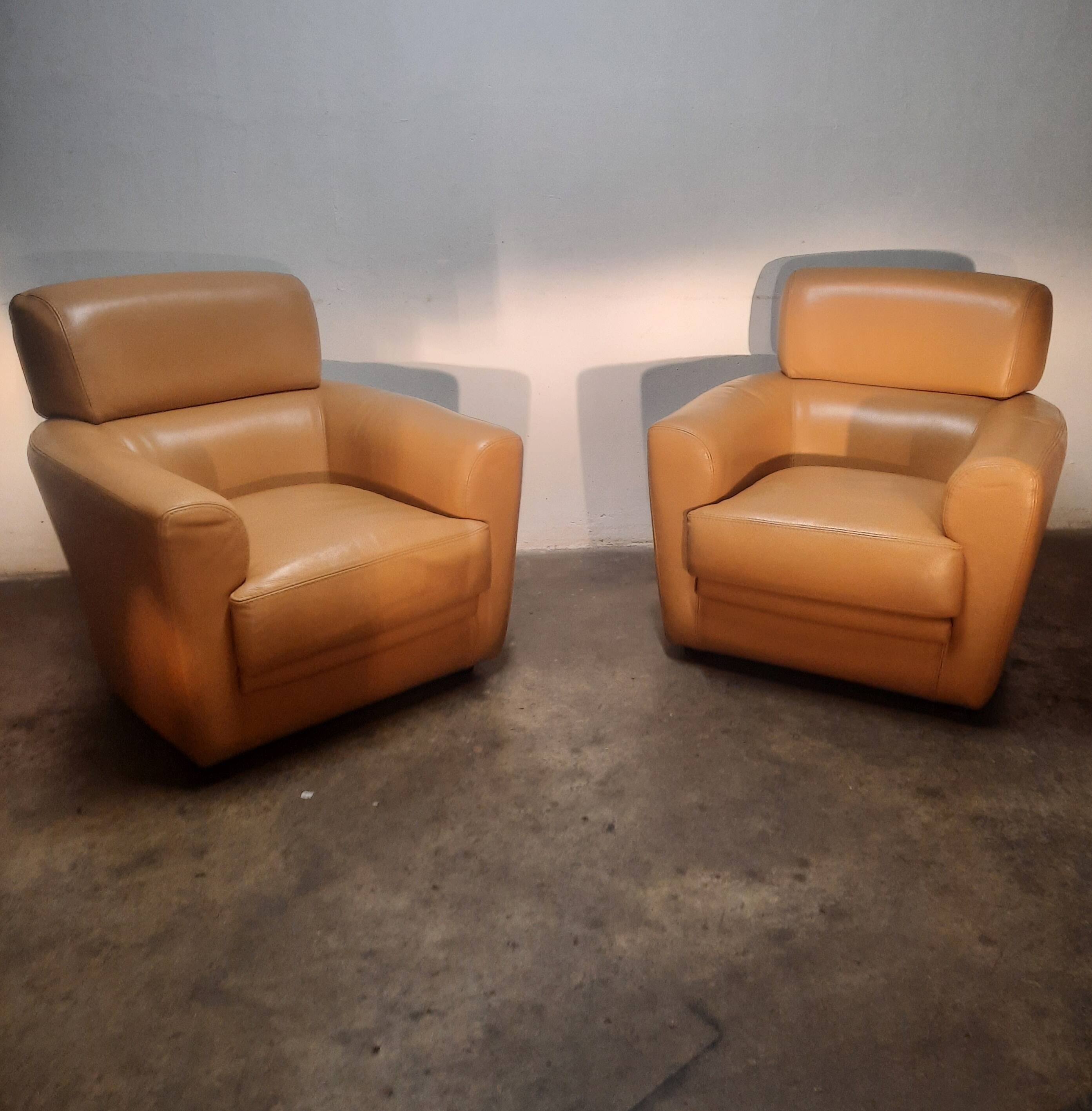 Paire de fauteuil club en cuir :roche et bobois"