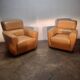 Paire de fauteuil club en cuir :roche et bobois"