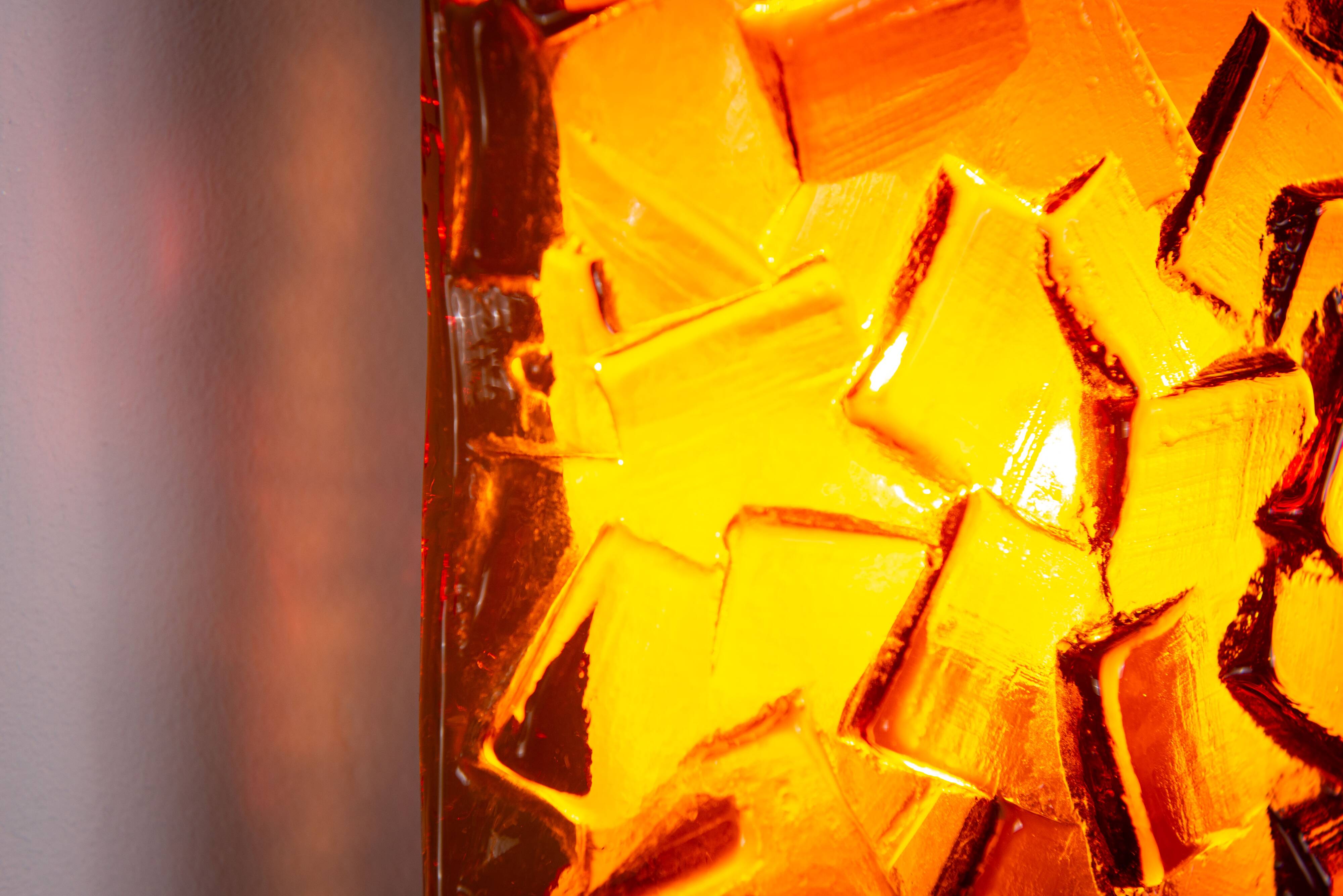 Vitrika Nybro amber coloured wall lamps