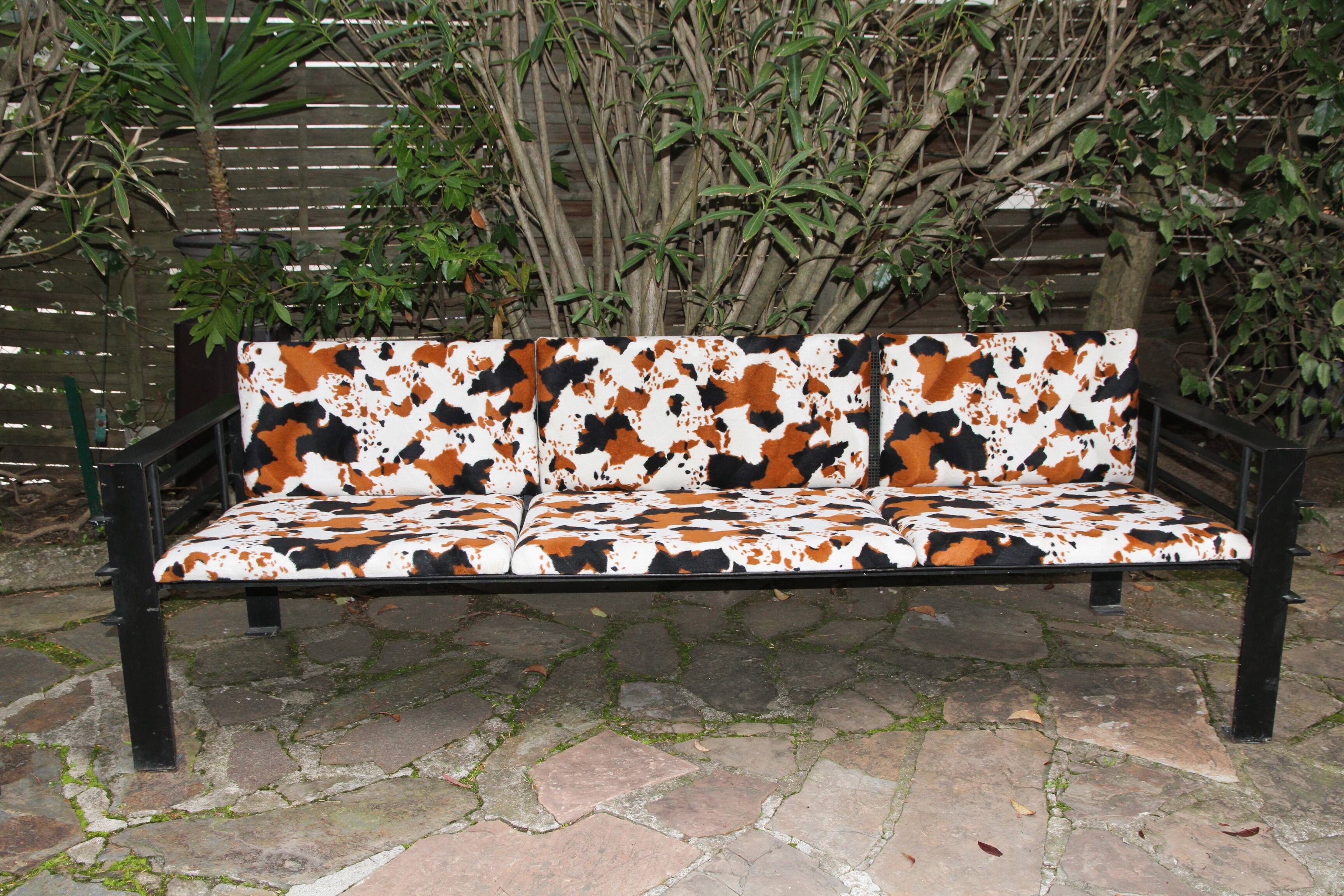 Set of sofas, armchair and coffee table in wrought iron by Jean Michel Wilmotte.