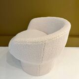 Round armchair in the style of Paulin