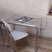 1950s chrome and fabric compass base chair
